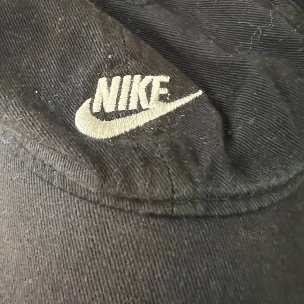 Nike Black kids hat. 19” circumference